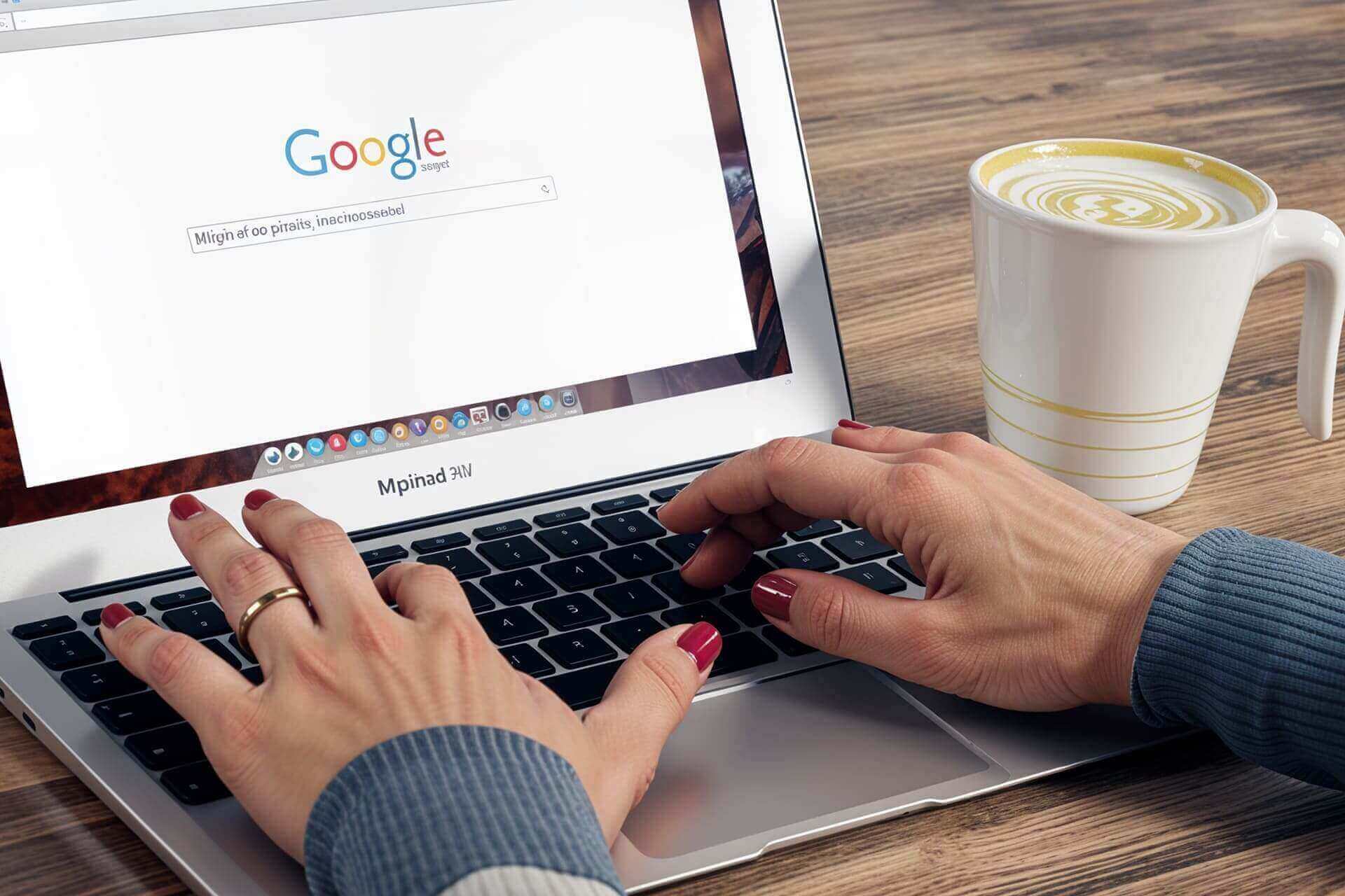 Person in front of computer managing campaigns in Google Ads